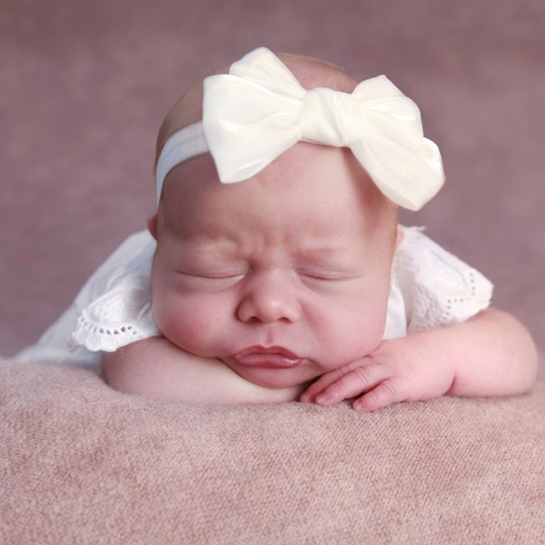 Newborn baby girl photographed by Sarah Ratcliffe in Bilston home