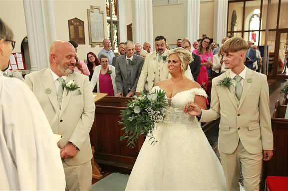 Bride & Groom at the alter All Saints Church Sedgley Photographed by Wolverhampton wedding photographer Sarah Ratcliffe